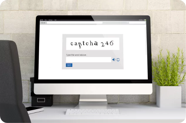 monitor displaying text based captcha in office setting
